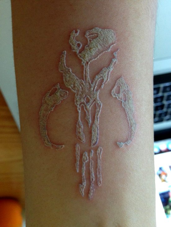 White Ink Tattoos On Dark Skin