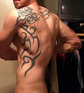 Guy Back Shoulder Tattoo