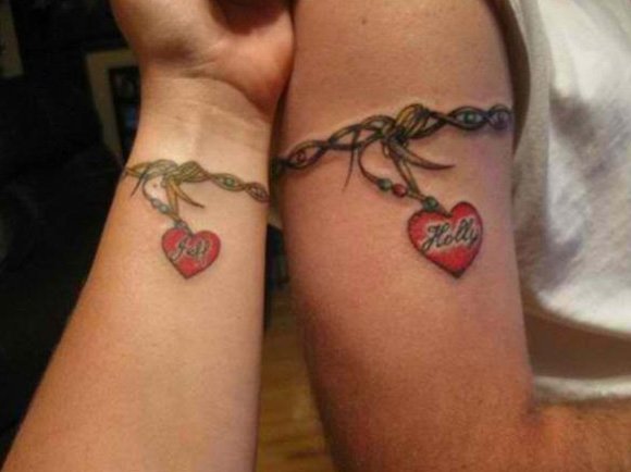 A very beautiful couple name tattoo, really beautiful