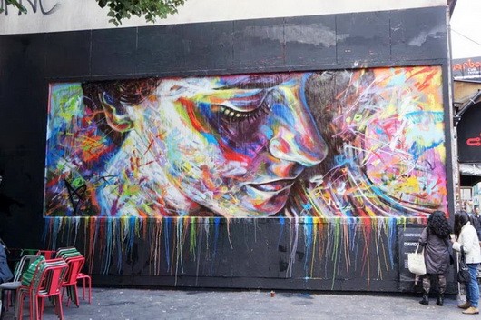 A colorful street graffiti of a woman