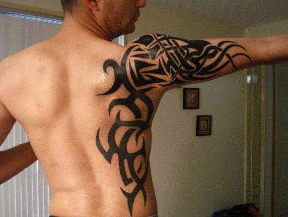 tribal tattoos across shoulders back